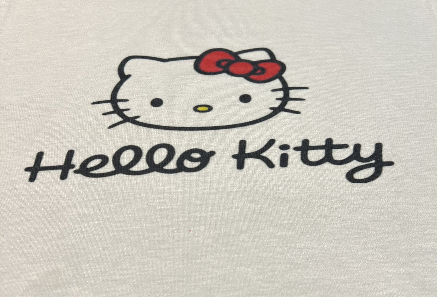 a cute kitty face design and red bow