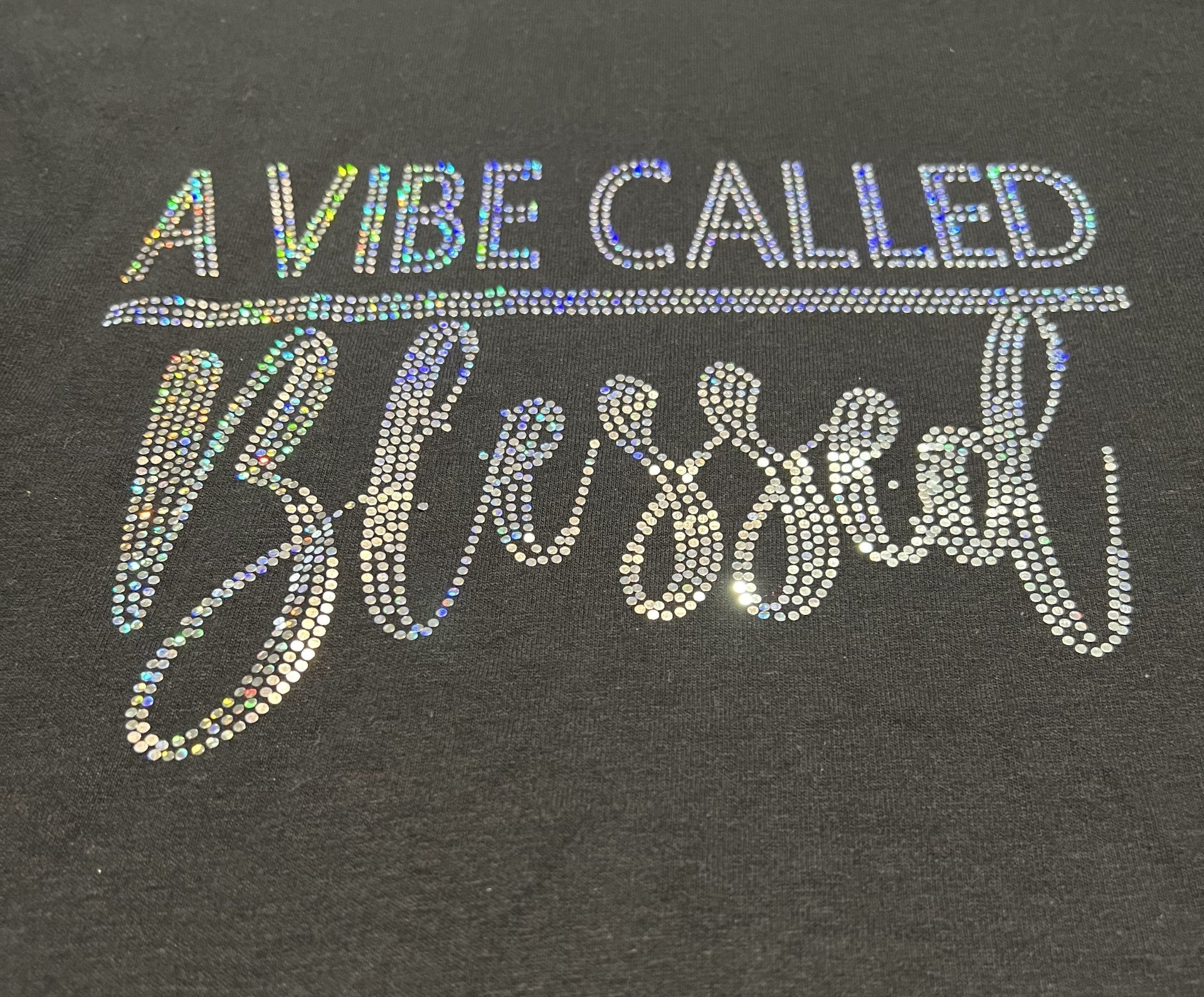 sparkling text that reads a vibe called blessed