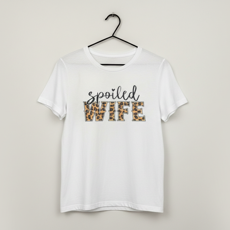 White graphic t shirt with text that reads spoiled wife and leopard print wife lettering