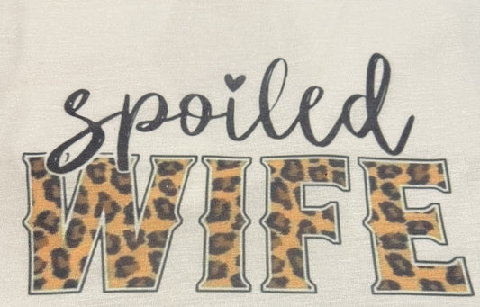 text that reads spoiled wife and leopard print wife lettering