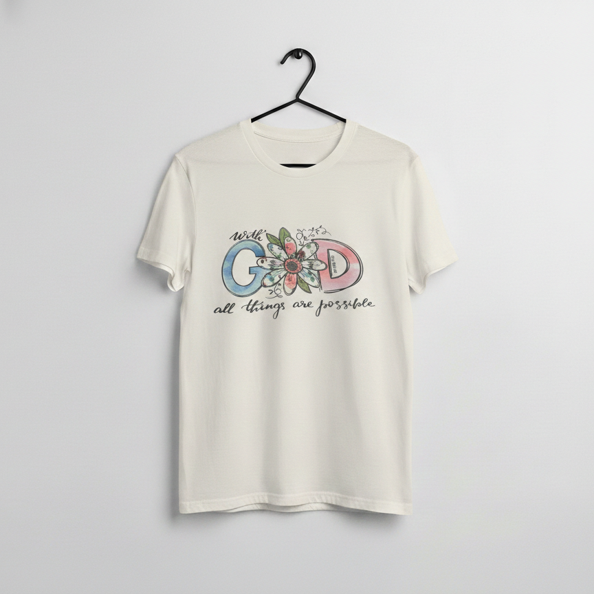 Cream graphic t shirt with colorful GOD letters, floral accent, and the phrase with God all things are possible