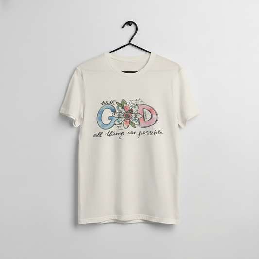 Cream graphic t shirt with colorful GOD letters, floral accent, and the phrase with God all things are possible