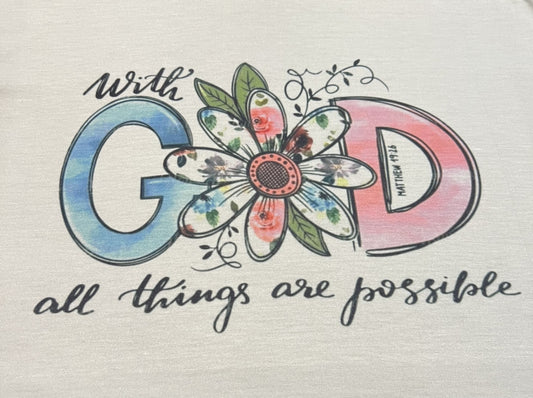Cream graphic t shirt with colorful GOD letters, floral accent, and the phrase with God all things are possible